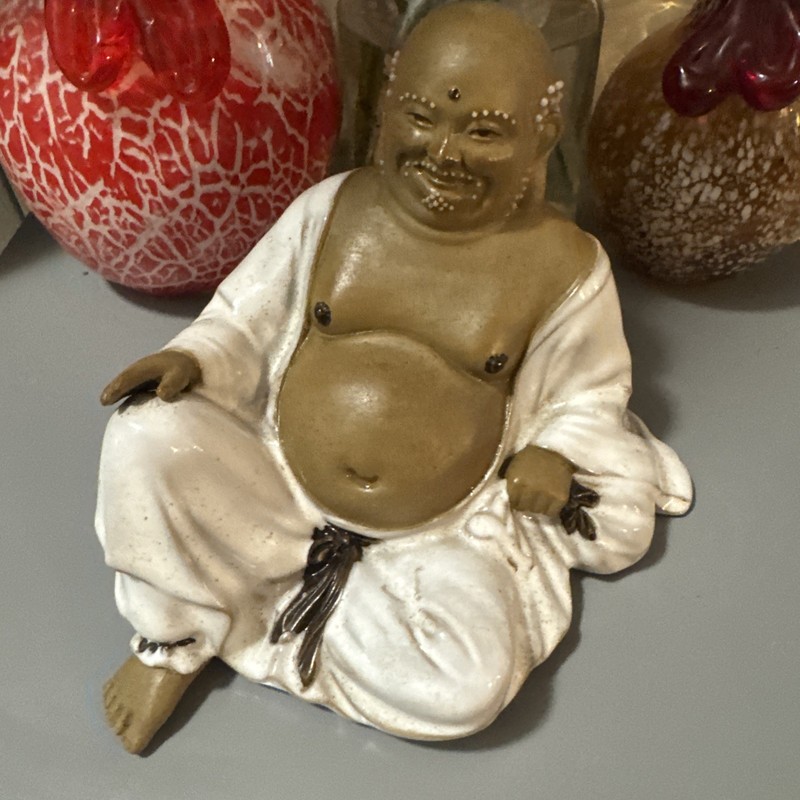 Laughing Buddha eccentric Chinese Ch'an (Zen) monk exposed belly symbolize joy