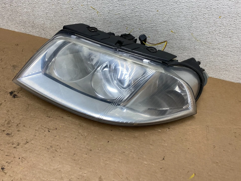 Faro halógeno izquierdo conductor Volkswagen Passat 2001-2005 OEM P1255 DW Foto 2 de 4