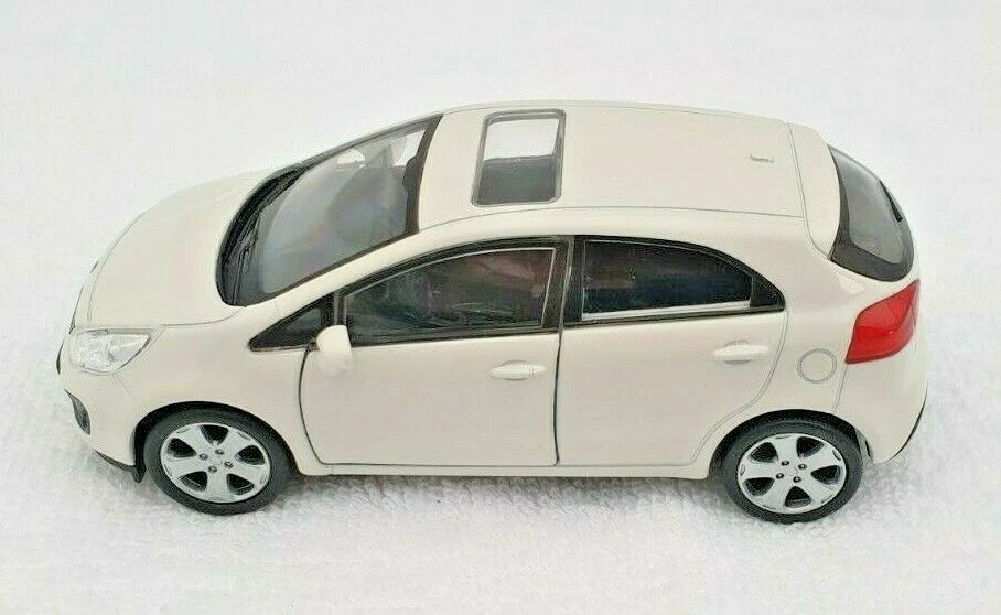 BLITZ VERSAND KIA RIO creme Welly Modell Auto 1:34 NEU & OVP BOX - Bild 3 von 3