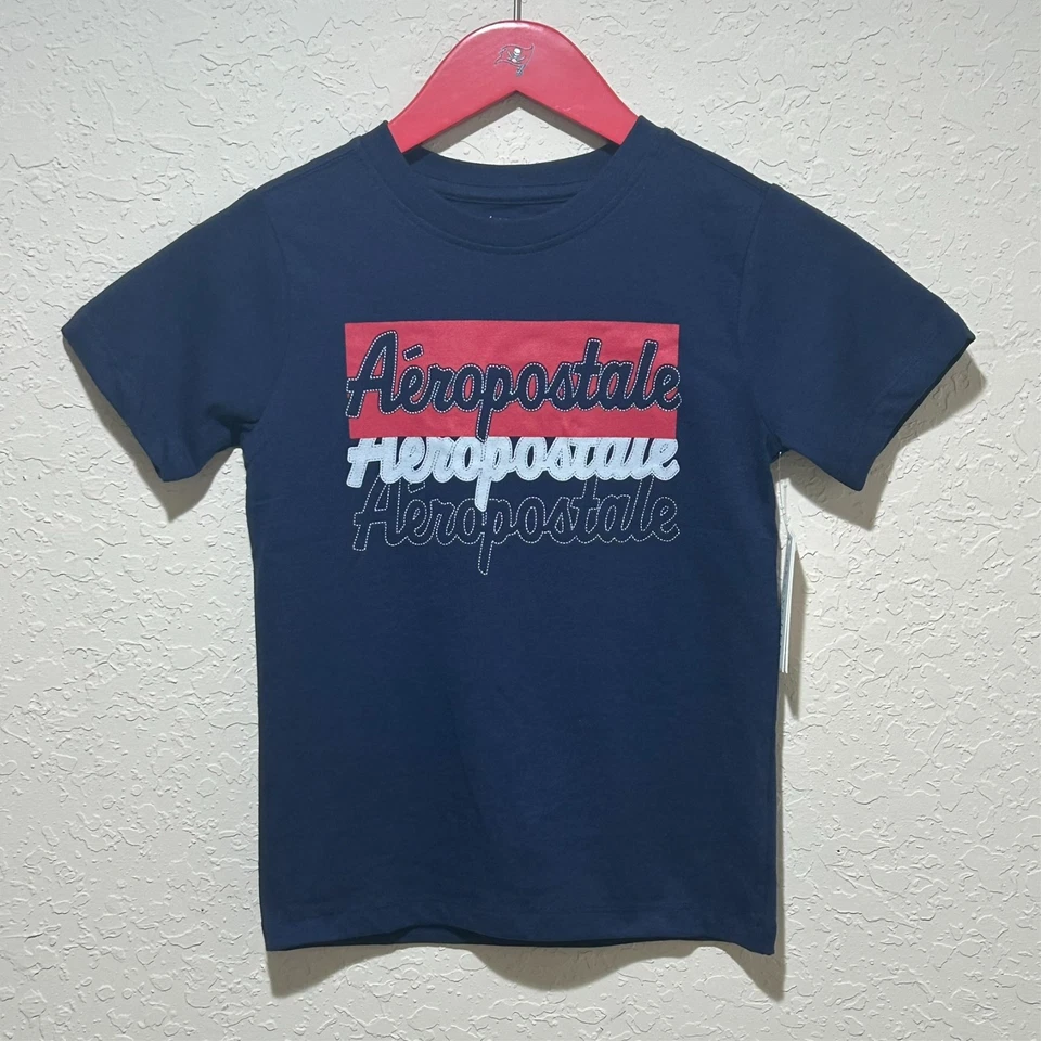 Camiseta gráfica Aeropostale para niños logotipo gráfico algodón azul marino talla L (7) Foto 2 de 4