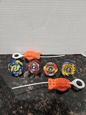 Beyblades Lot Of 4 With Launchers