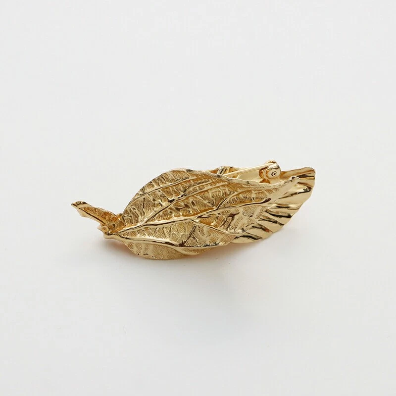Broche Christian Dior vintage feuille dorée N/comme neuve bijou occasion années 80 accessoires
