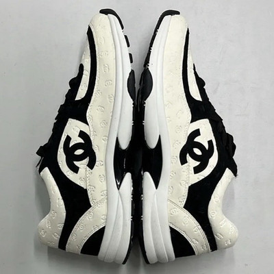CHANEL Unisex Sneaker EU 43 Low Top Schnürung Logo Schwarz Weiß