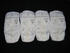 4 Huggies overnights Disposable Diapers Size 7 over 41 Lb  Lbs.