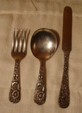 S. KIRK & SON, CHILD SILVERWARE SET, REPOUSSE STERLING SILVER