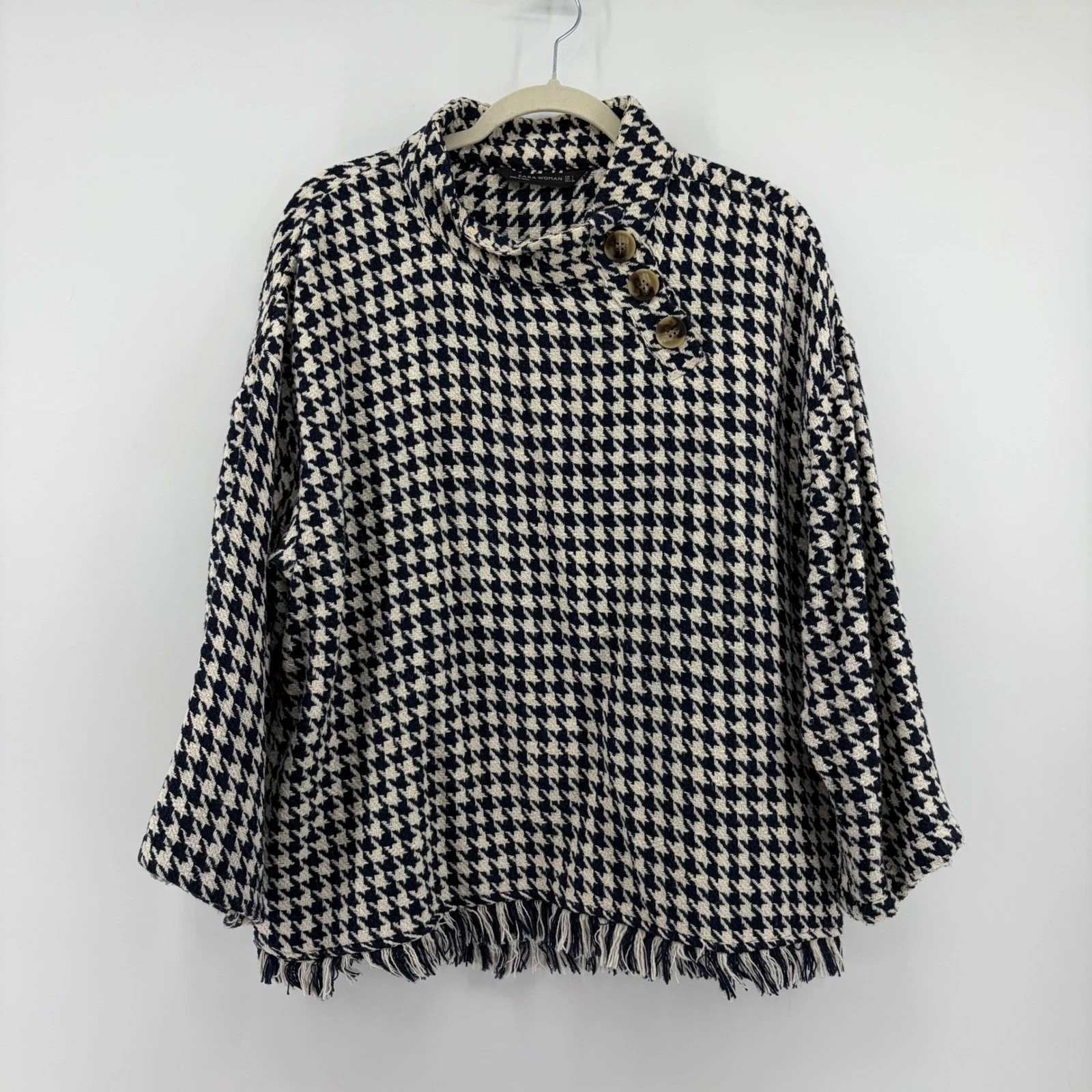 Zara Womens Large Navy Houndstooth Poncho Sweater Fringe Mock Neck Button Detail
Opens in a new wind