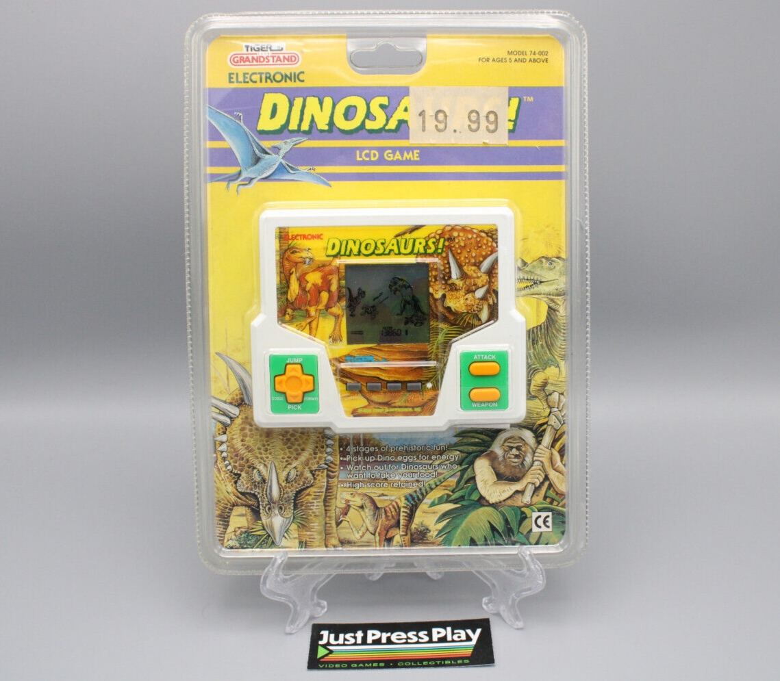 1992 Tiger Electronic Grandstand Dinosaurs! Handheld LCD Game