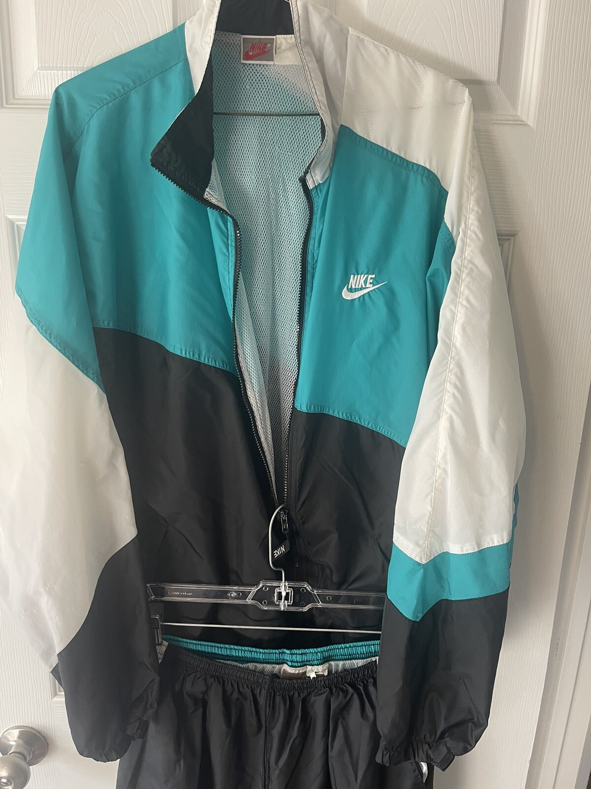 nike windbreaker turquoise