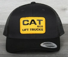 Vintage CAT Lift Trucks Patch on a Yupoong 6606 Trucker Snapback Hat CAT