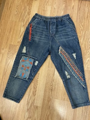 this item appears to be a pair of women's patchwork ripped denim harem pants.