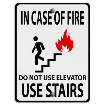 Vertical Metal Sign In Case of Fire Do Not Use Elevator Weatherproof Street