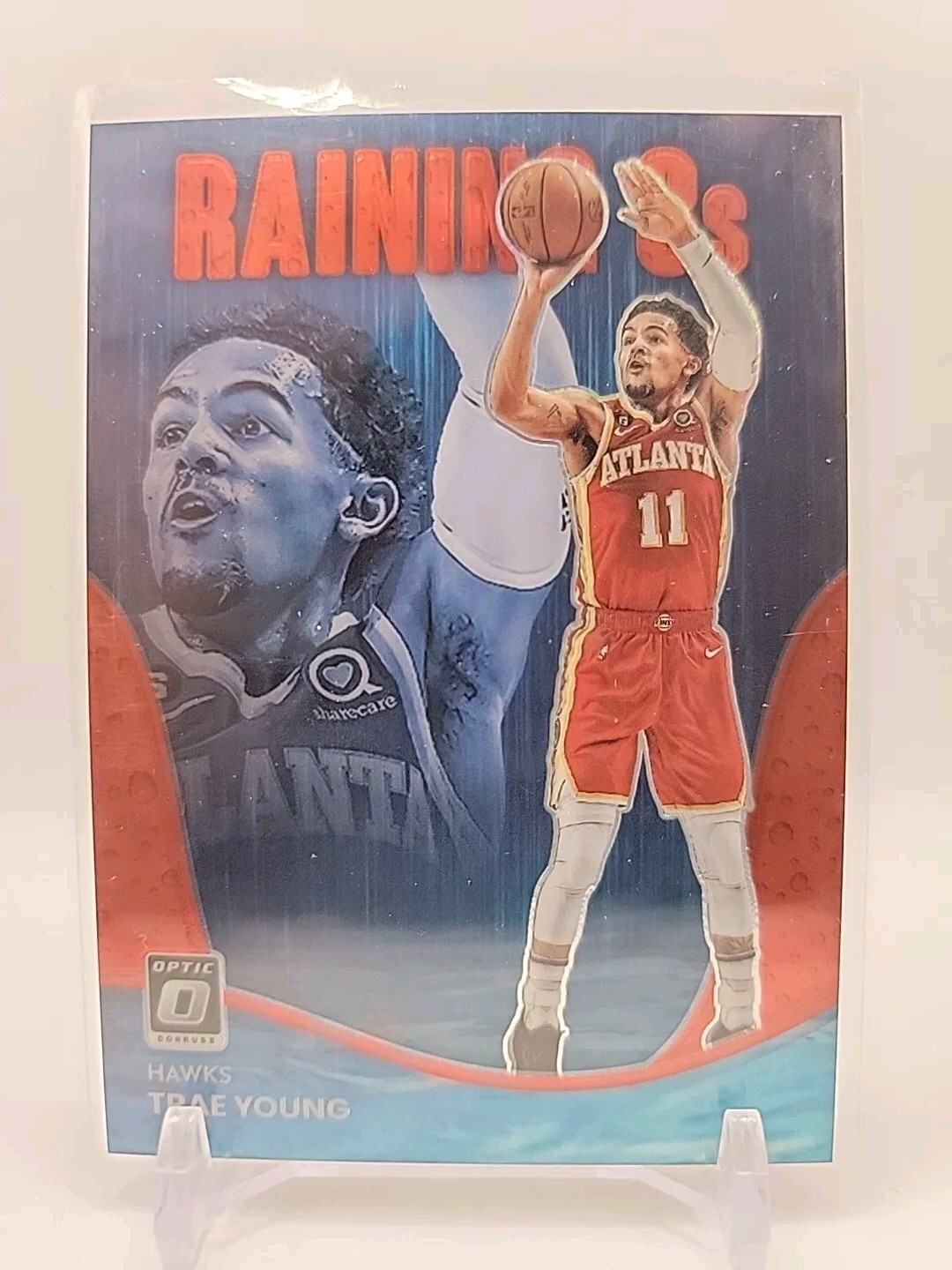 2022-23 Donruss Optic Trae Young #8 Raining 3s Red Prizm /99 Atlanta Hawks