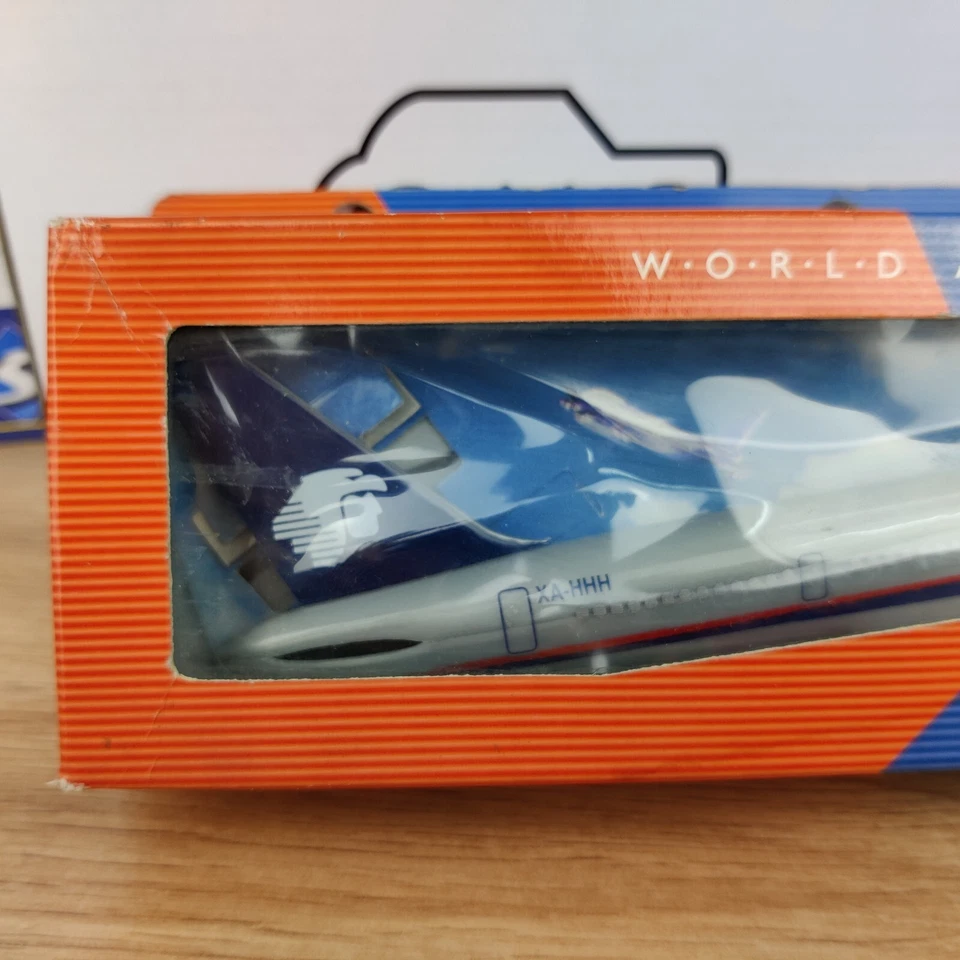 AEREO WOOSTER WORLD AIRLINES BOEING 757-200 AEROMEXICO 1:200 EN SCATOLA REF 6... - Immagine 2 di 4