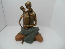 Statue Of Man and Woman Sitting 13" Tall Resin No Maker Mark Bronze Finish