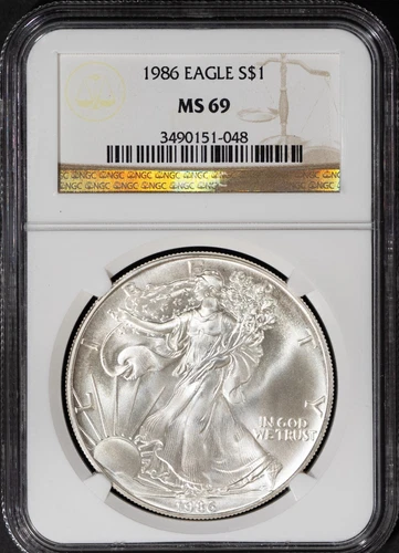 1986 $1 Silver American Eagle MS 69 NGC # 3490151-048 + Bonus