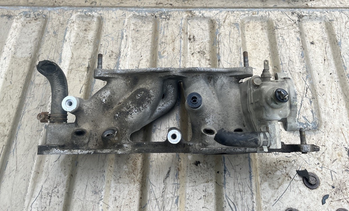 1990-1996 Mitsubishi Mighty Max Lower Intake Manifold OEM 4G64