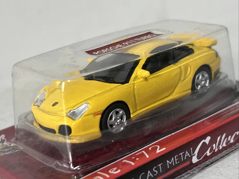 FIRMA DE CARRETERA ESCALA 1/72 - COCHE MODELO DIECAST PORSCHE 911 TURBO AMARILLO DE CARRERAS Foto 2 de 4
