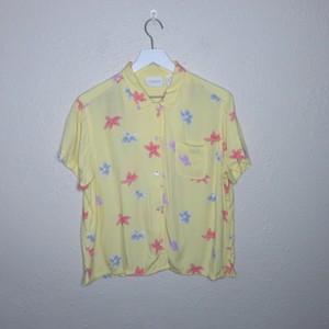 yellow flowy shirt