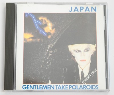 Japan: Gentlemen Take Polaroids CD - reissue with on-disc misprint.