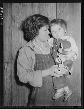 Photo:Migratory berry picker with her child. Ponchatoula, Louisiana