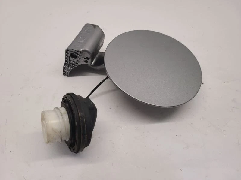 10 2011 11 2012 12 2013 13 2014 14 Hyundai Tucson 2010 puerta de llenado de combustible plateada Foto 2 de 4