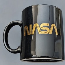 Vintage NASA Space Agency Logo Ceramic Coffee Mug Cup Black and Gold 4" Tall