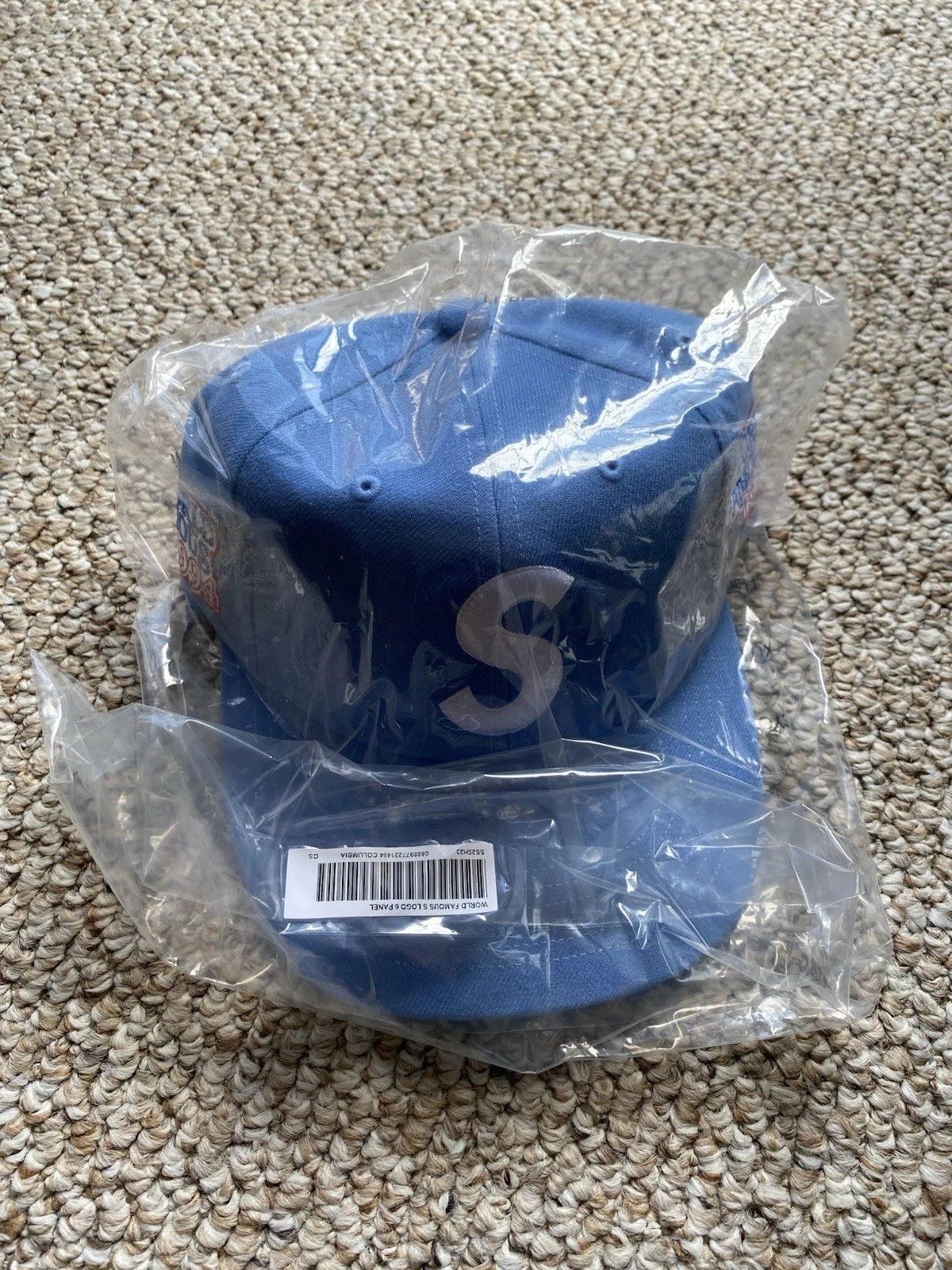 Chapeau 6 panneaux Supreme World Famous logo S bleu clair