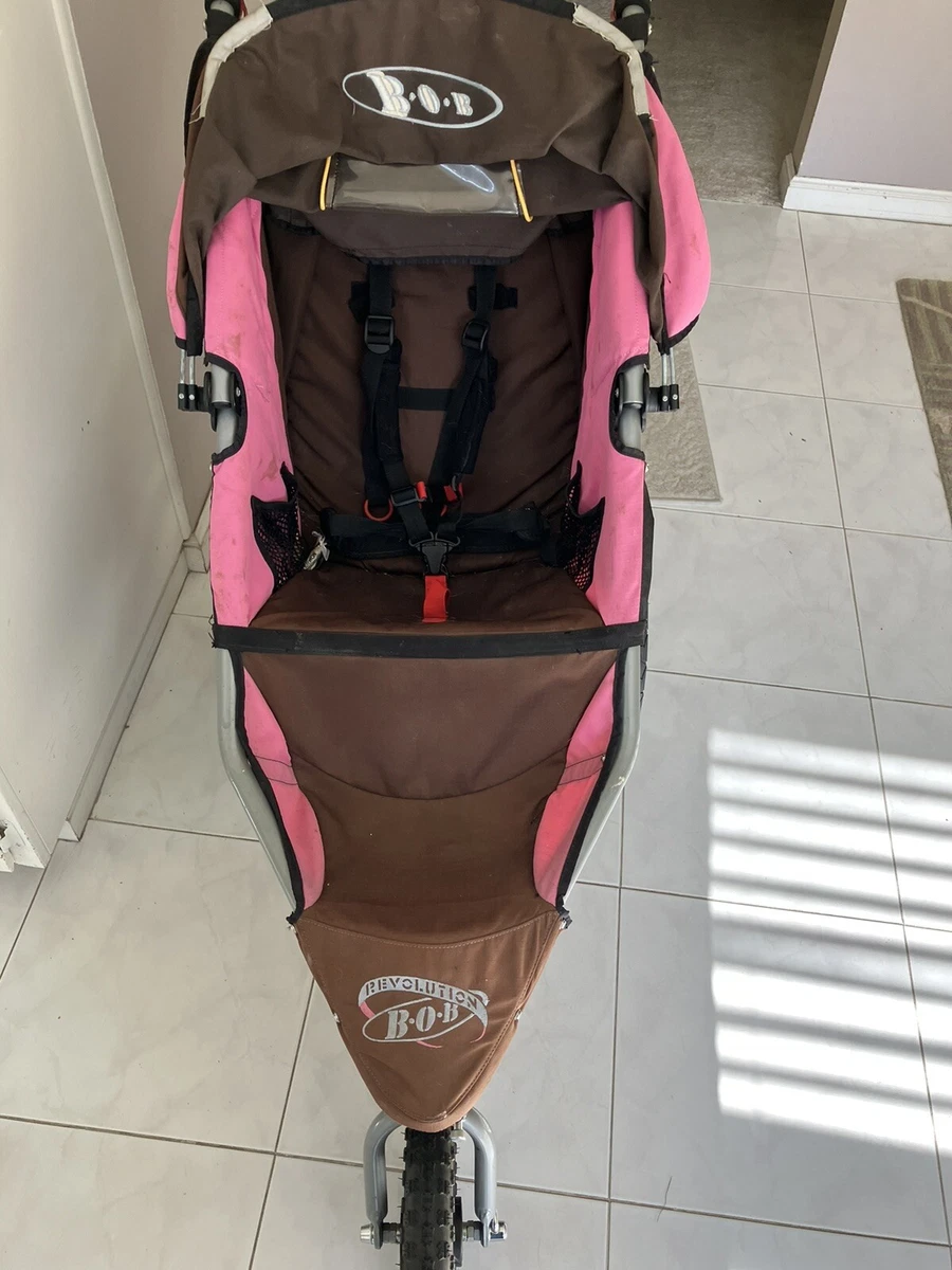Pink top bob stroller