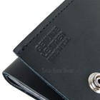 Black leather wallet with silver eagle logo, trucker biker chain tri-fold design, and “Texas Home Decor” text on front.