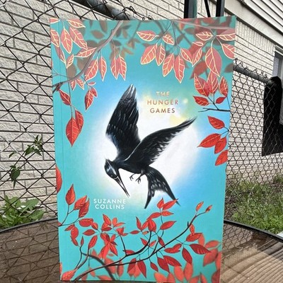 The Hunger Games by Suzanne Collins Hardcover w/ Dust Jacket, Scholastic 2023
