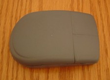 4 COMPUTER MOUSE STRESS BALLS. Dark grey.