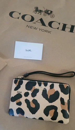 Pochette da polso Coach nuova con etichetta stampa leopardata rivestita con zip angolare