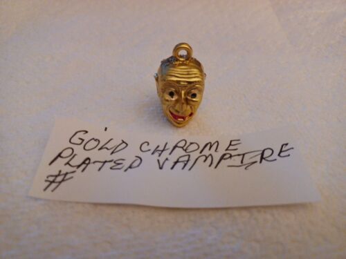 VINTAGE GUMBALL RARE GOLD CHROME PLATED VAMPIRE MONSTER HEAD PENCIL TOPPER CHARM - Picture 1 of 3