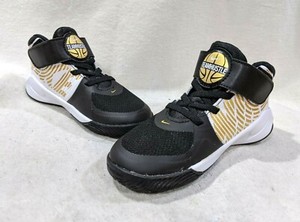 nike team hustle d9 black white gold