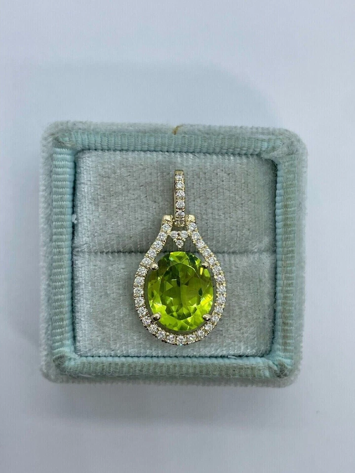 2 Ct Oval Cut Simulated Peridot Halo Pendant In 14K White Gold Plated Free Chain - Image 4 of 4