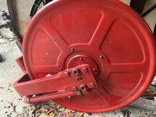 Water pipe reel, for fire hose or for garden, farm or industry.