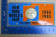 New York Booster License Plate Tag 1964 1965 World's Fair Graphic Unisphere NY