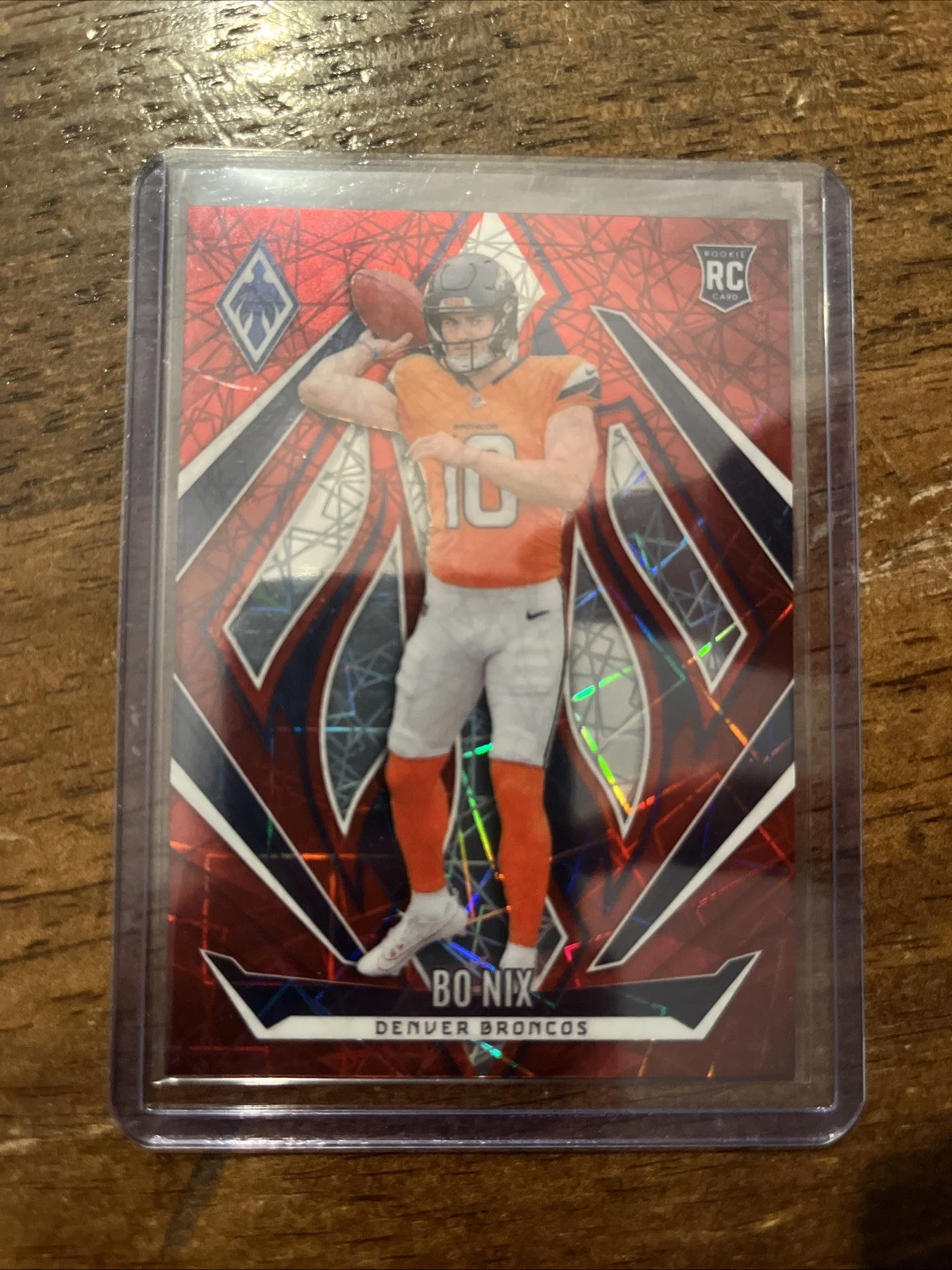2024 Panini Phoenix - Rookies Bo Nix #159 (RC) Red Laser 37/199 (Mint)