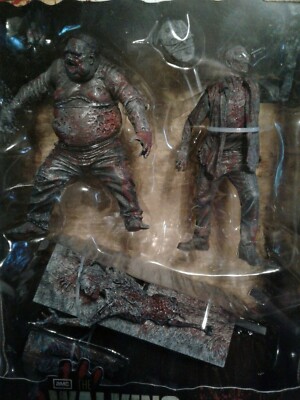McFarlane Toys - The Walking Dead - 3 Zombie Sanguinanti In Bianco E Nero (Bicycle Girl & RV Zombie) - Confezione Da 3