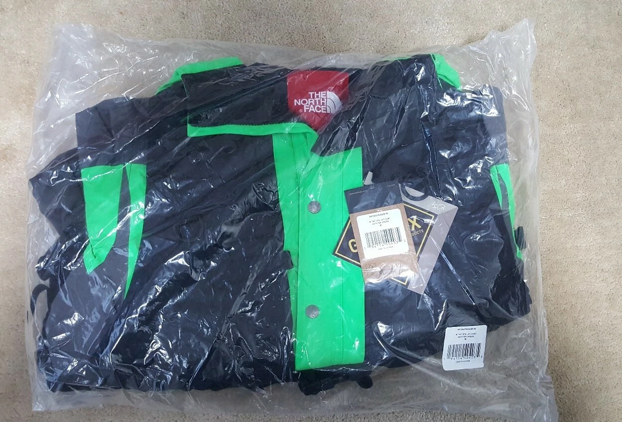VESTE GILET SUPREME X THE NORTH FACE RTG TAILLE M VERT VIF MOYEN À LA MAIN