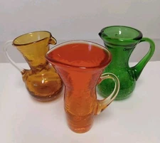Lot Of 3 Hand Blown Crackle Glass Pitcher Vase Jug Orange Green Amber Handle