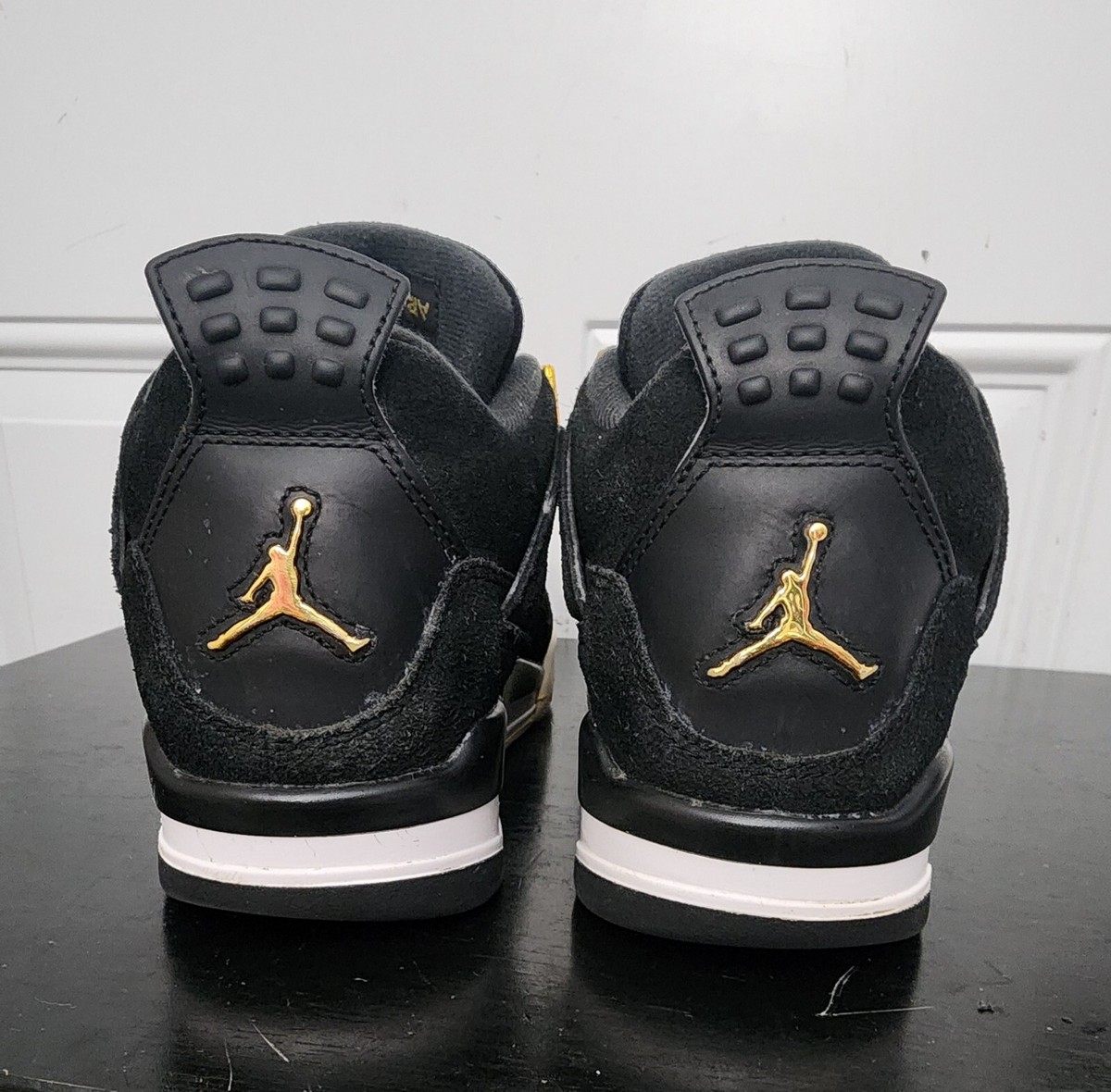black and gold royalty jordans