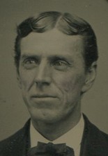 MAN TRYING TO NOT LAUGH, SO RARE. TINTYPE IN PERIOD MAT.