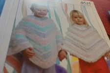 Stylecraft Knitting Pattern 8016 Child Ponchos 22-32"