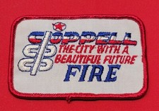 PARCHE INSIGNIA VINTAGE DEL DEPARTAMENTO DE BOMBEROS DE COPPELL TEXAS