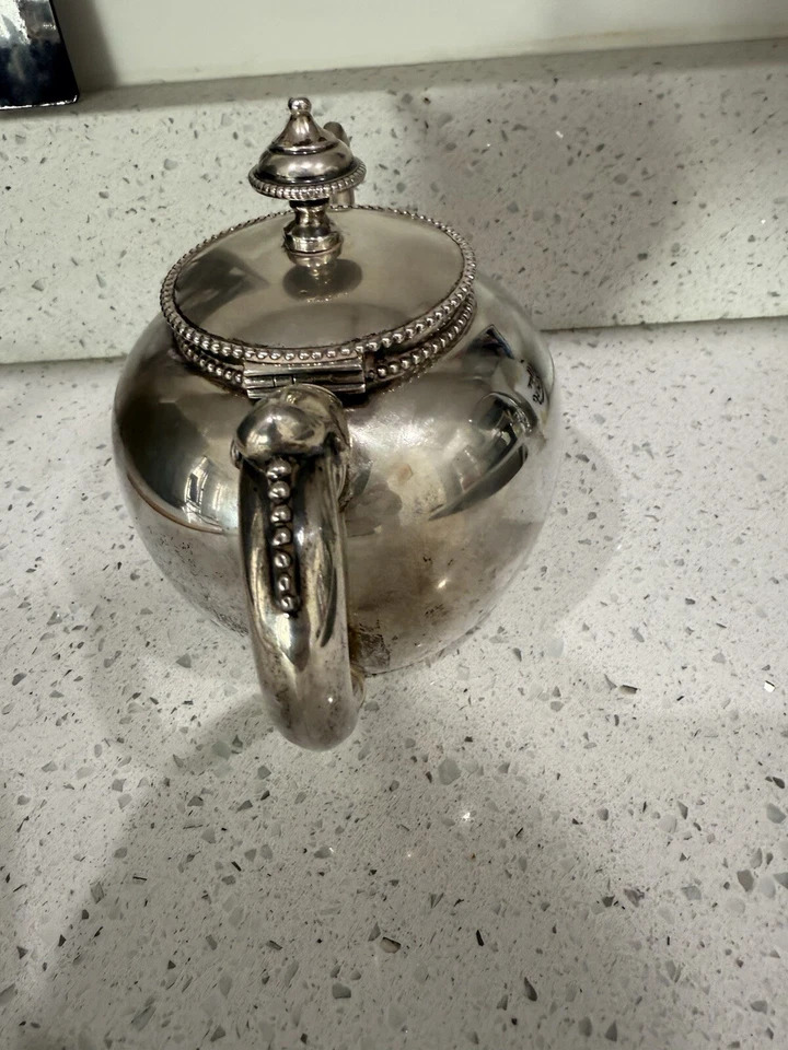 Antigua tetera holandesa de plata esterlina del siglo XIX del Museo Van Kempen Foto 3 de 4