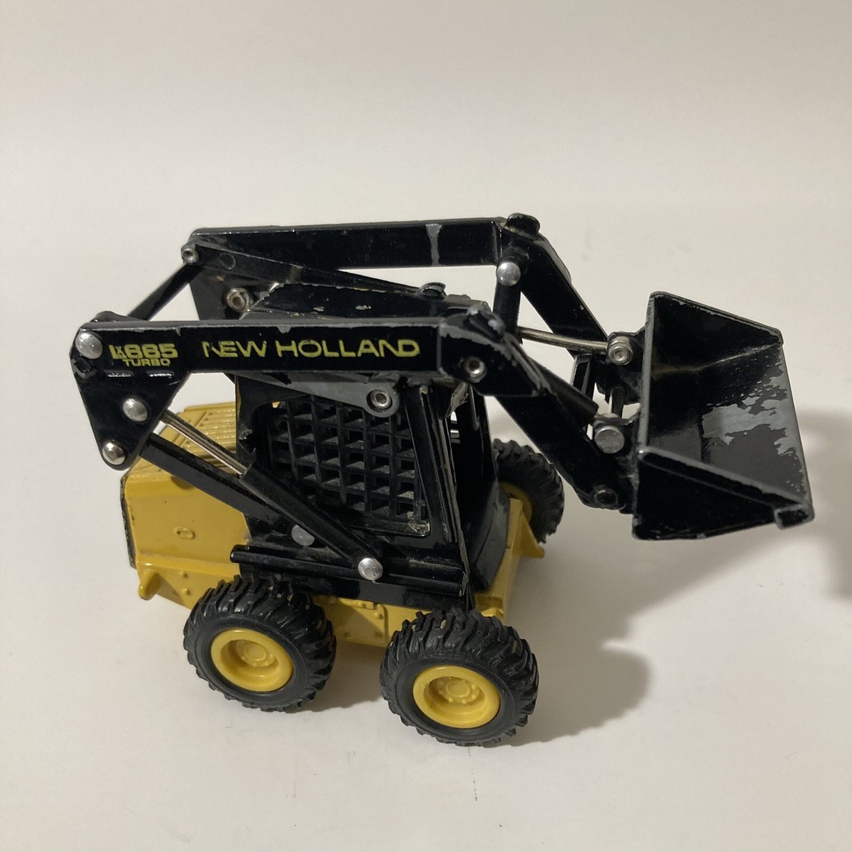 【にゃん】 New Holland LX665 Turbo Skid Steer Loader Black 1:64 Scale