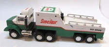 Vintage 1997 Sinclair Dinosaur Race Car Tender Semi Truck SG 2000 Plastic Toy