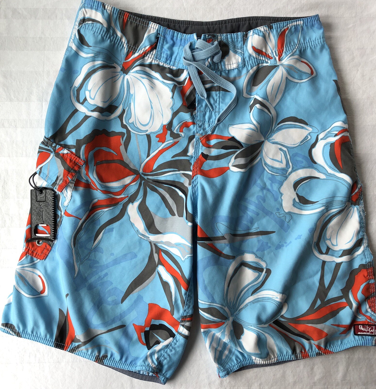 Quicksilver Hawaiian print Board Shorts/Trunks Size 30 With Bottle