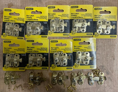 #ad 14 New packaged and unpackaged Brass Finish Stanley Bar Latches. $30.00